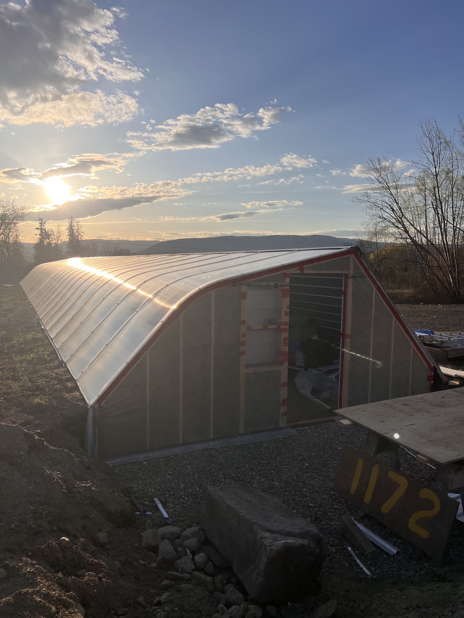 Passive Solar Geothermal Greenhouse at Fresh Valley Farms - Greenhouse in the Snow