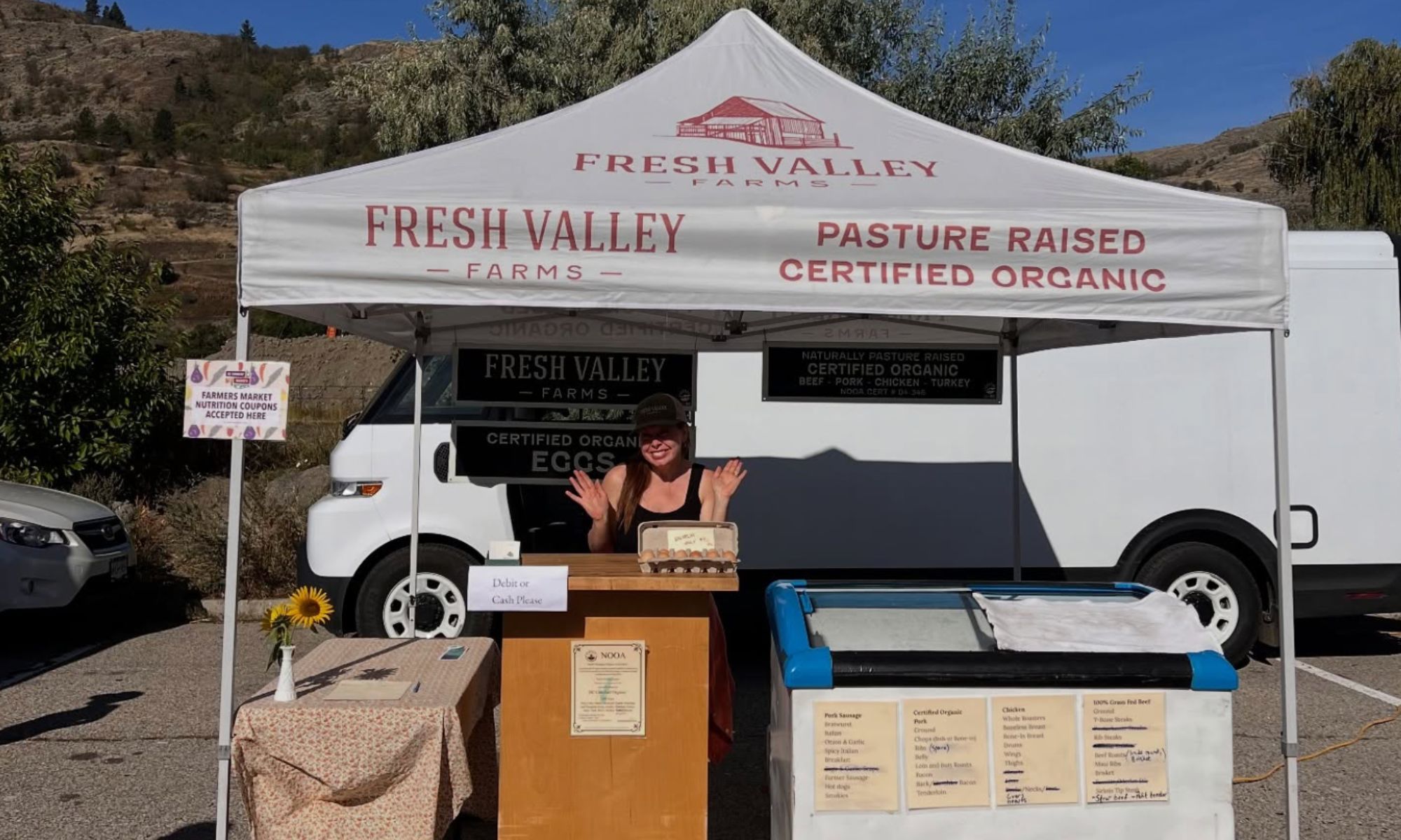 Picking up orders at Farmers Market - Fresh Valley Farms